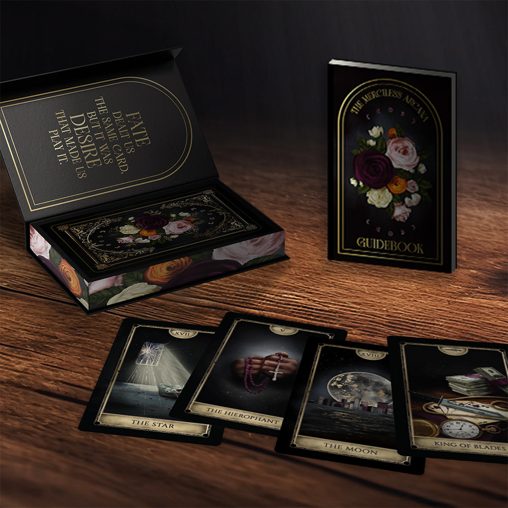 Set of tarot cards with a guidebook on a wooden surface