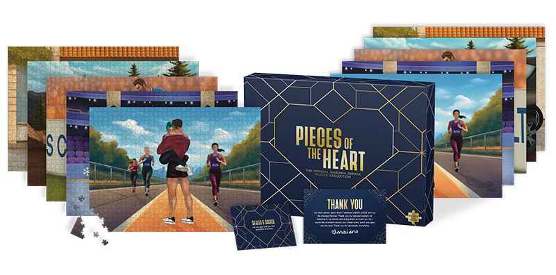 Collection of puzzle boxes with scenic designs and 'Pieces of the Heart' branding.